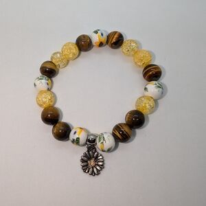 Handmade Yellow and Brown Beaded Bracelet with Floral Charm